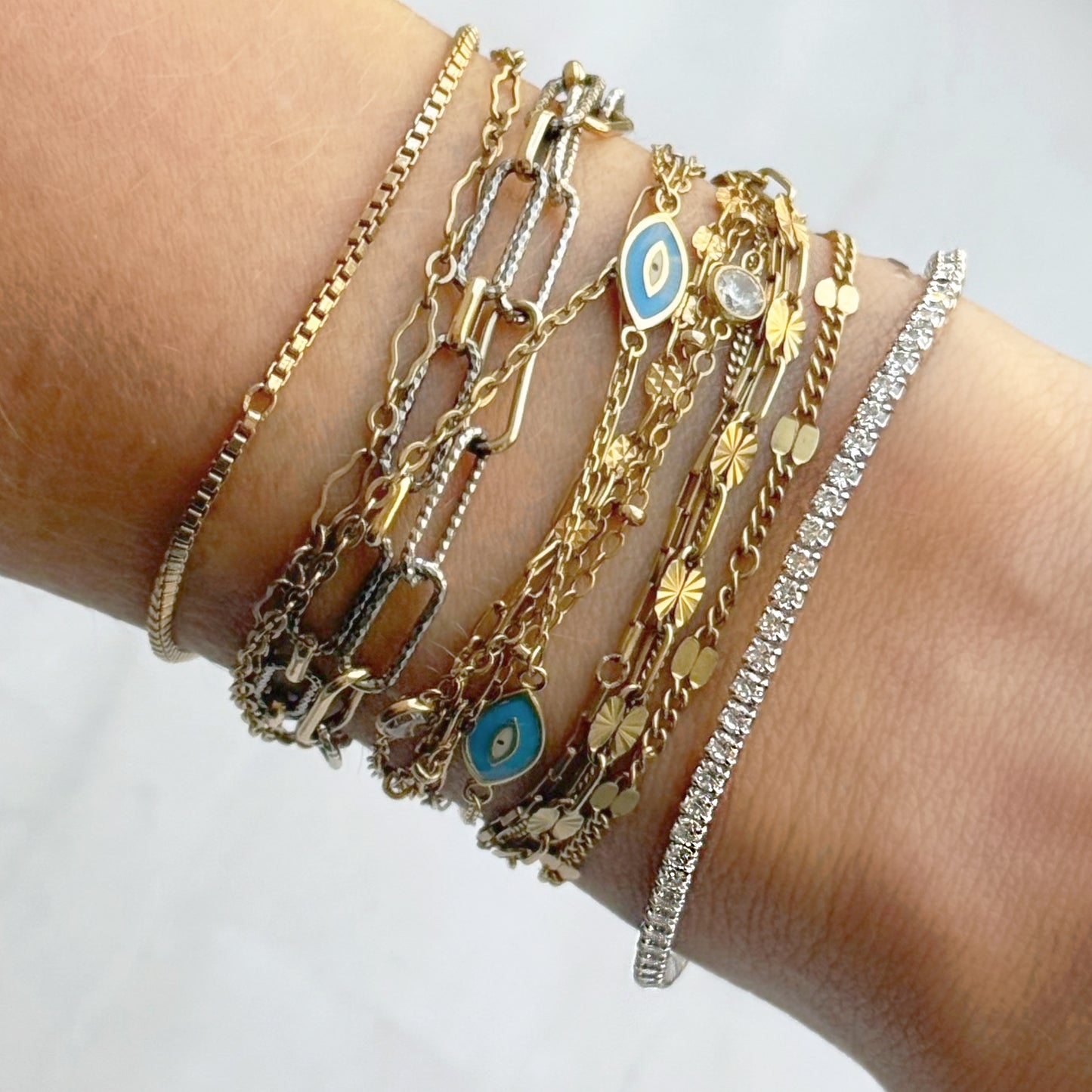 Permanent Bracelets with a CZ Tennis Bracelet
