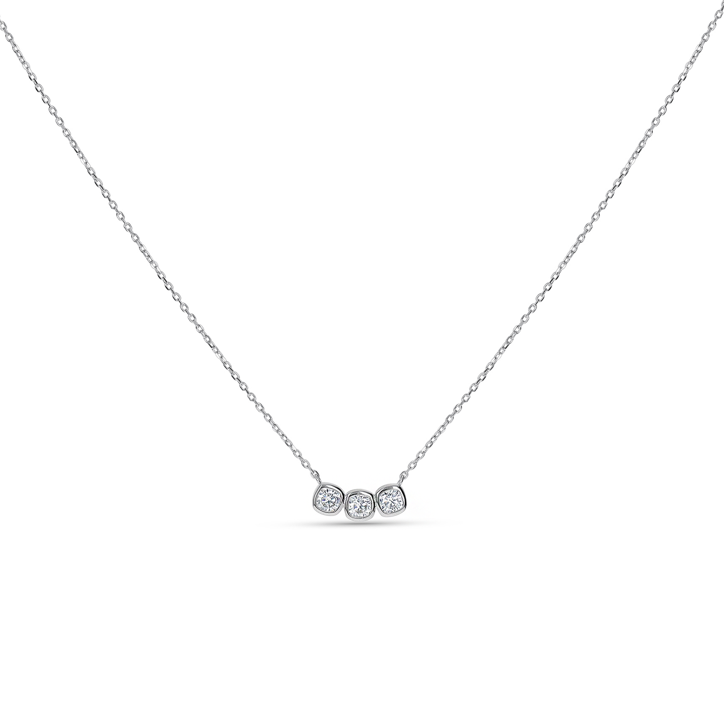 A delicate silver chain necklace featuring a small horizontal bar with three bezel-set round clear gemstone.