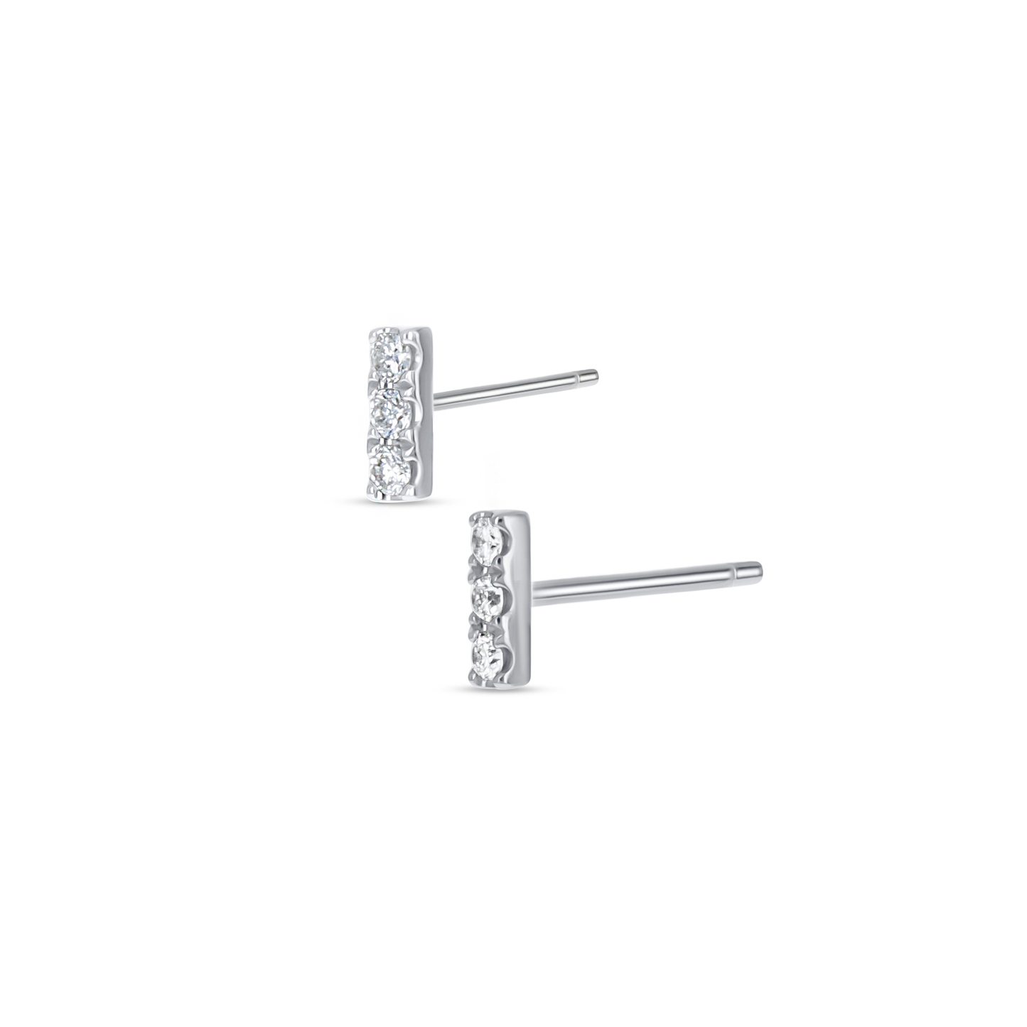 Tiny white gold and diamond bar stud earrings from Alexandra Marks Jewelry.