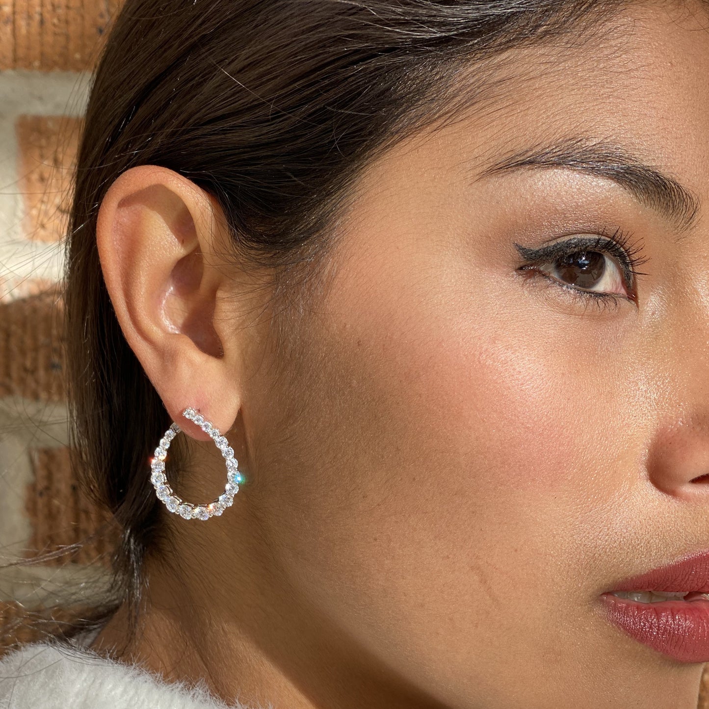 Wearing Alexandra Marks curved CZ Hollywood Silver Earrings