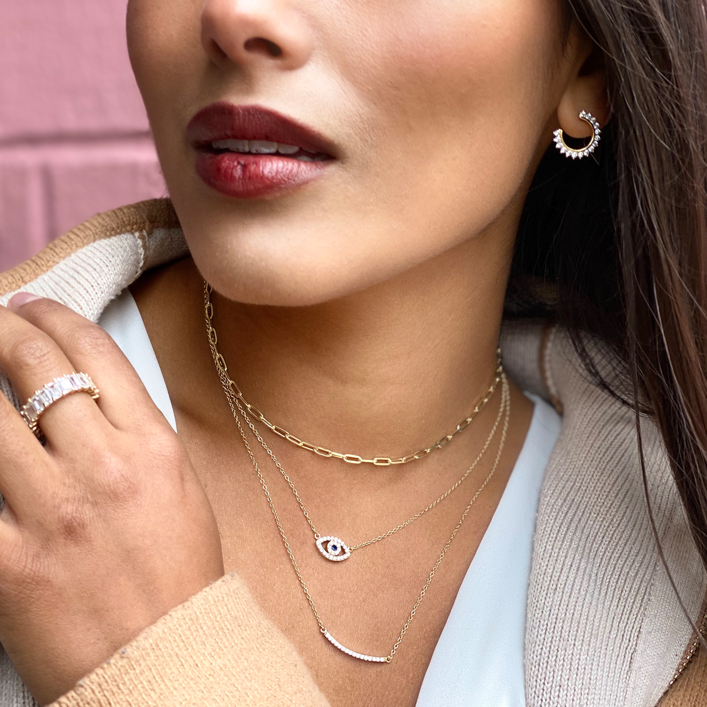 Wearing Alexandra Marks gold CZ curved bar necklace