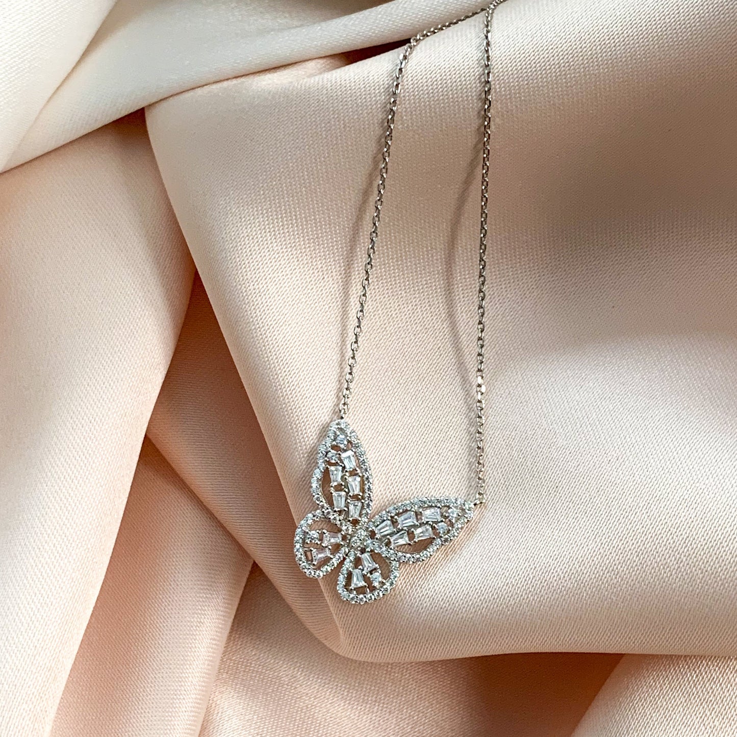 A symbol of change, this cz butterfly necklace inspires hope