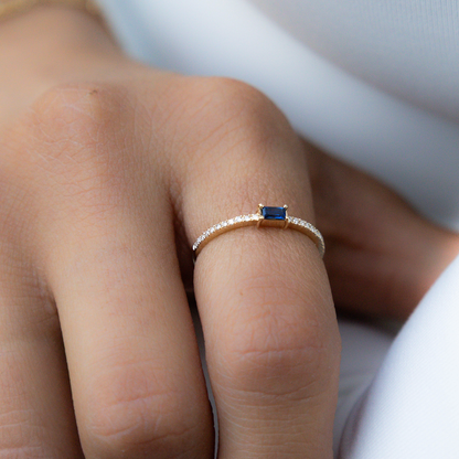 Thin Blue Sapphire Birthstone Ring in 14kt Yellow Gold with dainty diamond accent. 