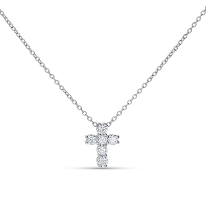 Dainty cross pendant necklace in sterling silver from Alexandra Marks Jewelry. 