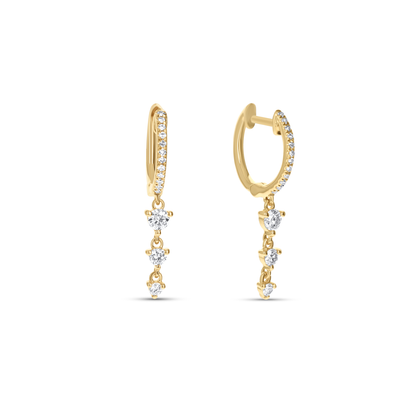 Dainty Diamond drop huggie hoop earrings in 14kt yellow gold from Alexandra Marks Jewelry