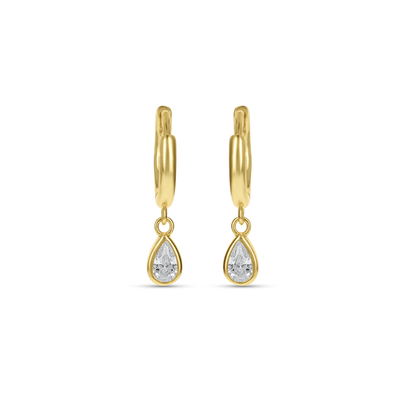 Clear CZ Charm Huggie Hoop Earrings in gold. 