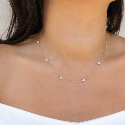 Gold necklace with diamond clover stations from Alexandra Marks Jewelry
