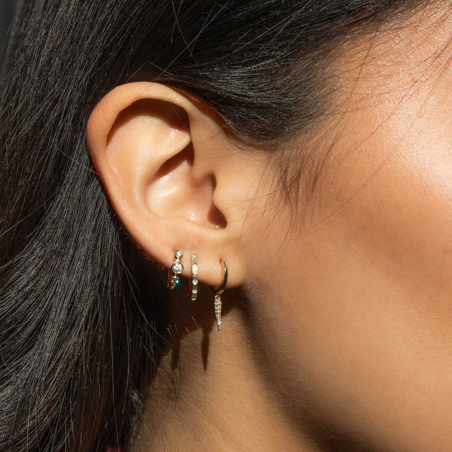 Diamond Hoop Earrings in 14kt Yellow Gold from Alexandra Marks Jewelry