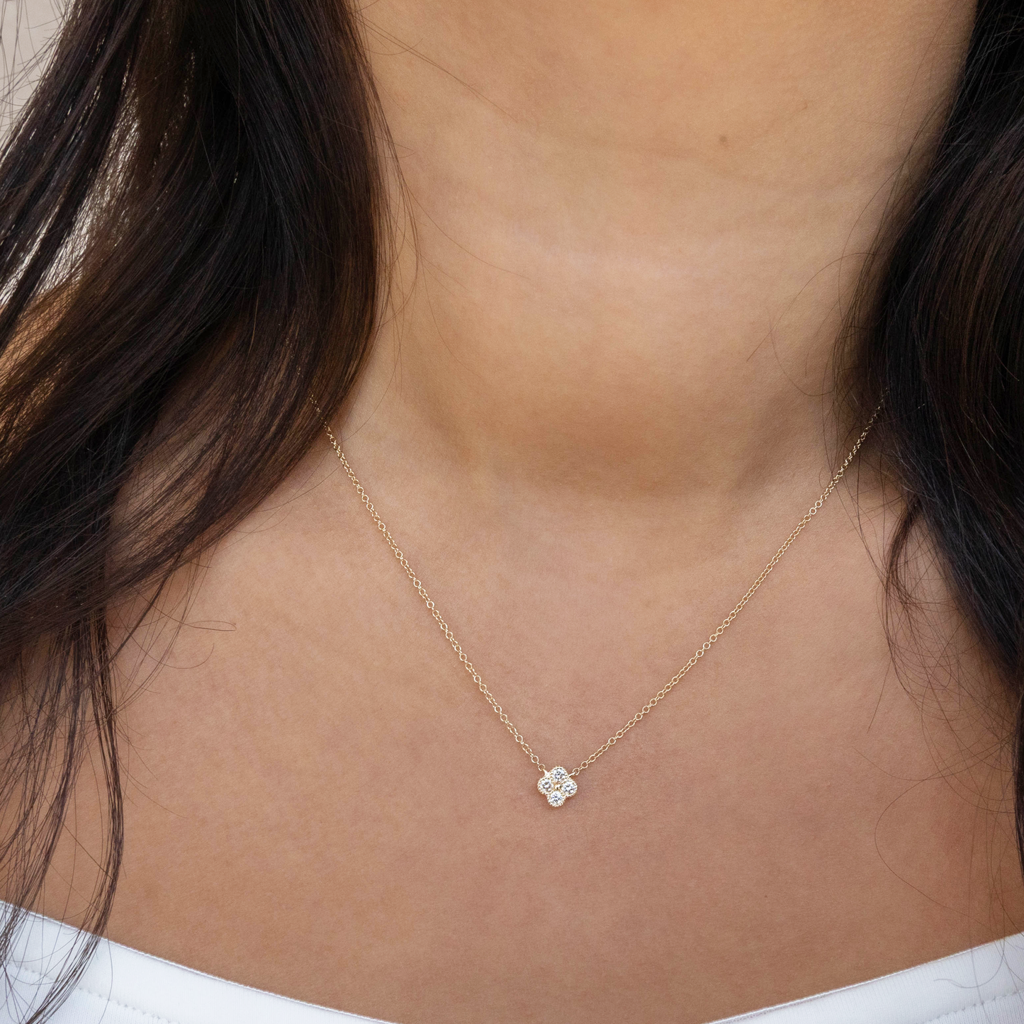 Dainty diamond clover necklace in yellow gold