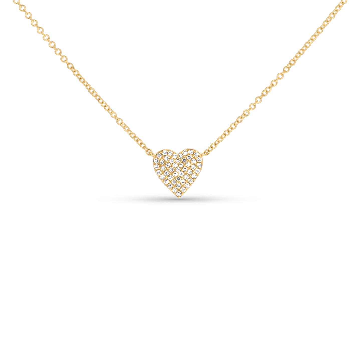 Affordable Everyday heart necklace with diamonds in yellow gold. 