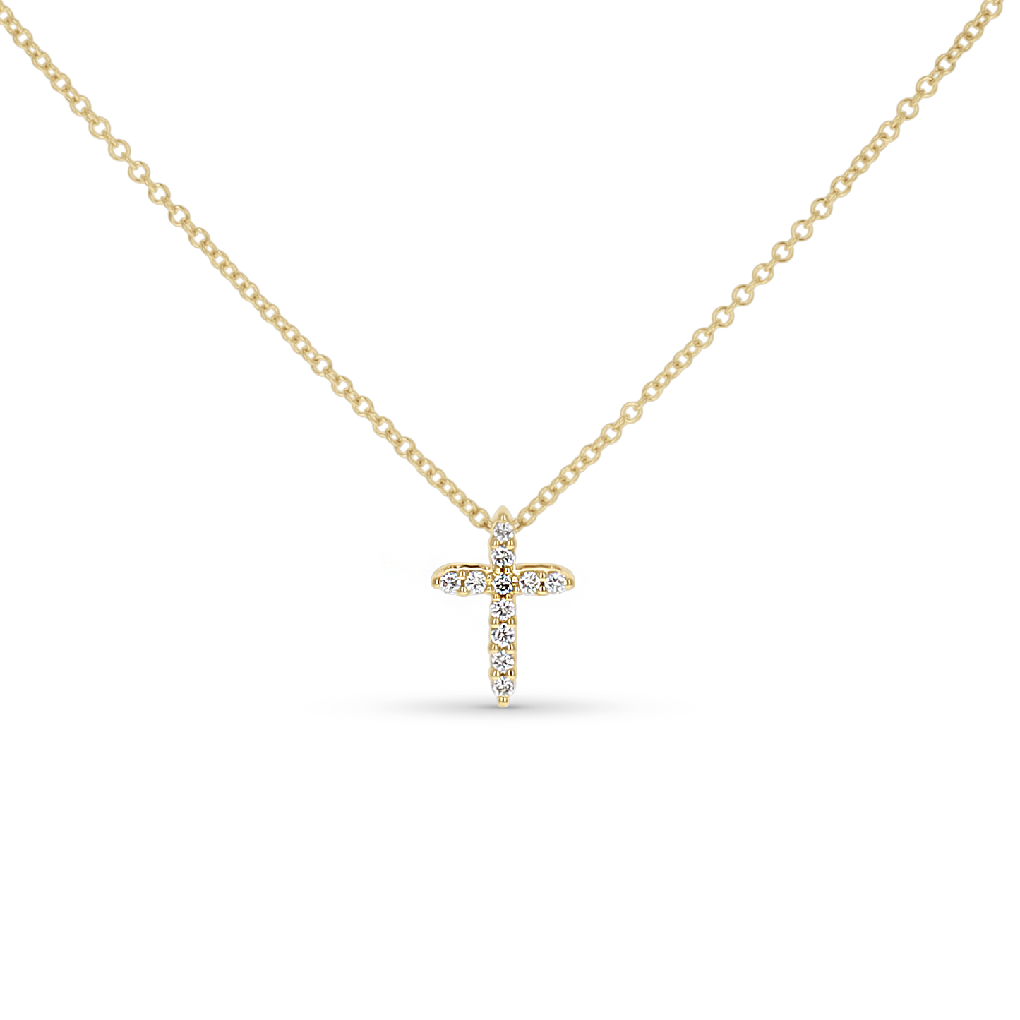 Simple cross necklace in 14kt yellow gold with diamonds