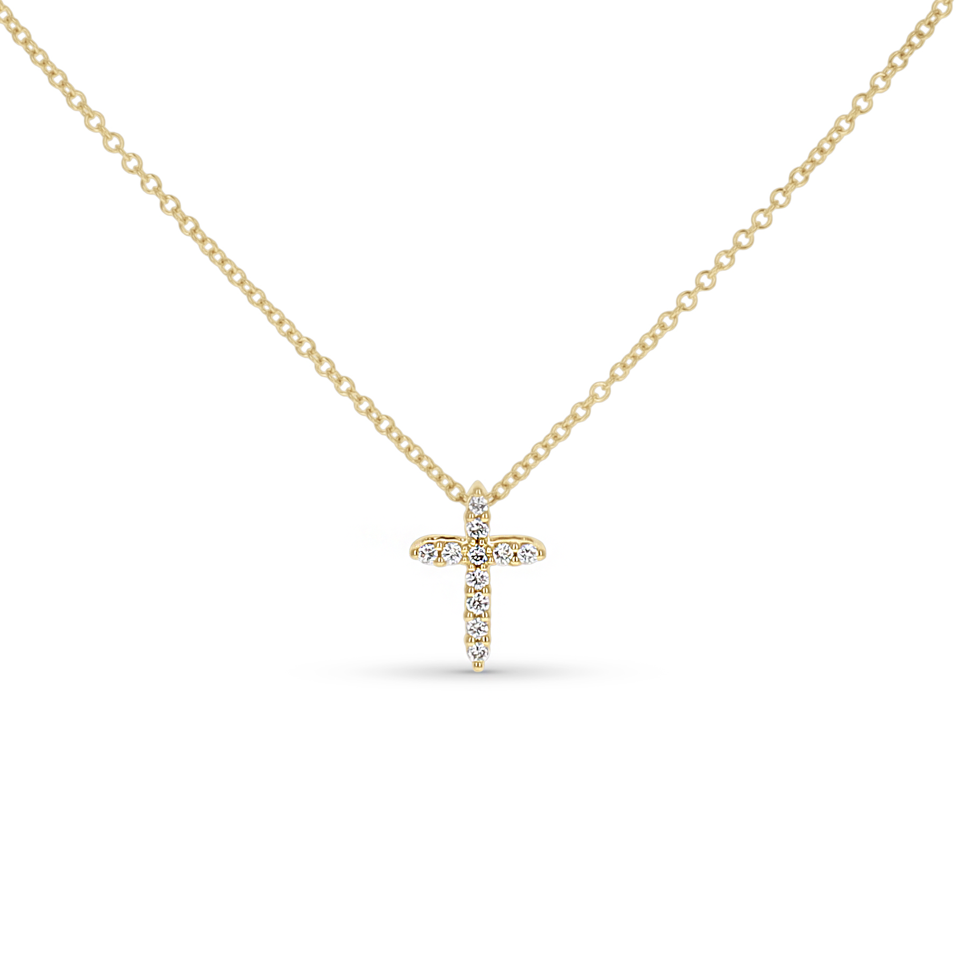 Simple cross necklace in 14kt yellow gold with diamonds