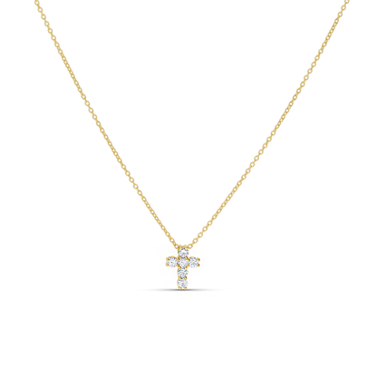 Cubic zirconia cross pendant necklace in gold from Alexandra Marks Jewelry. 