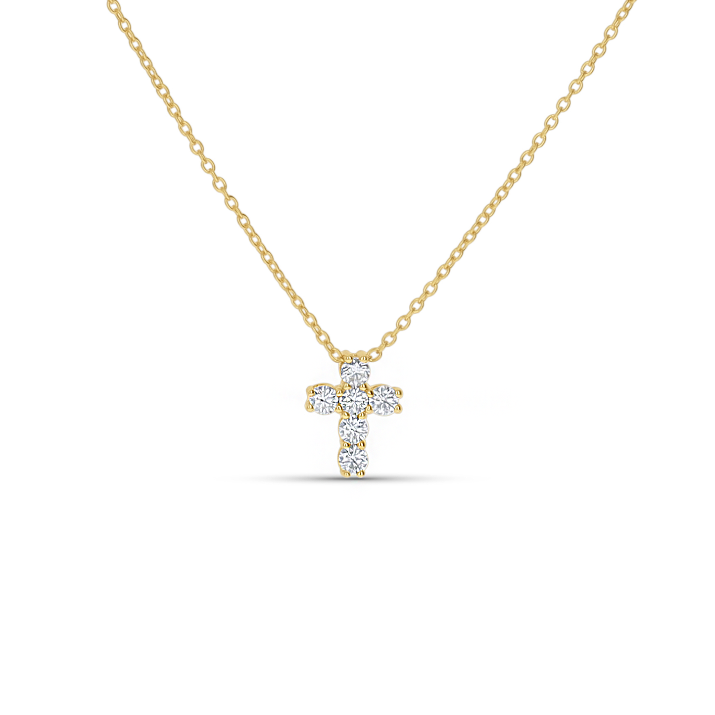 Simple CZ Cross Necklace in Gold from Alexandra Marks Jewelry. 