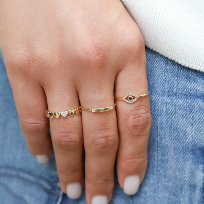 Thin Diamond Rings In Yellow Gold From Alexandra Marks Jewelry. 