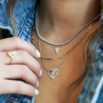 Gold and diamond heart necklace from Alexandra Marks jewelry in Chicago