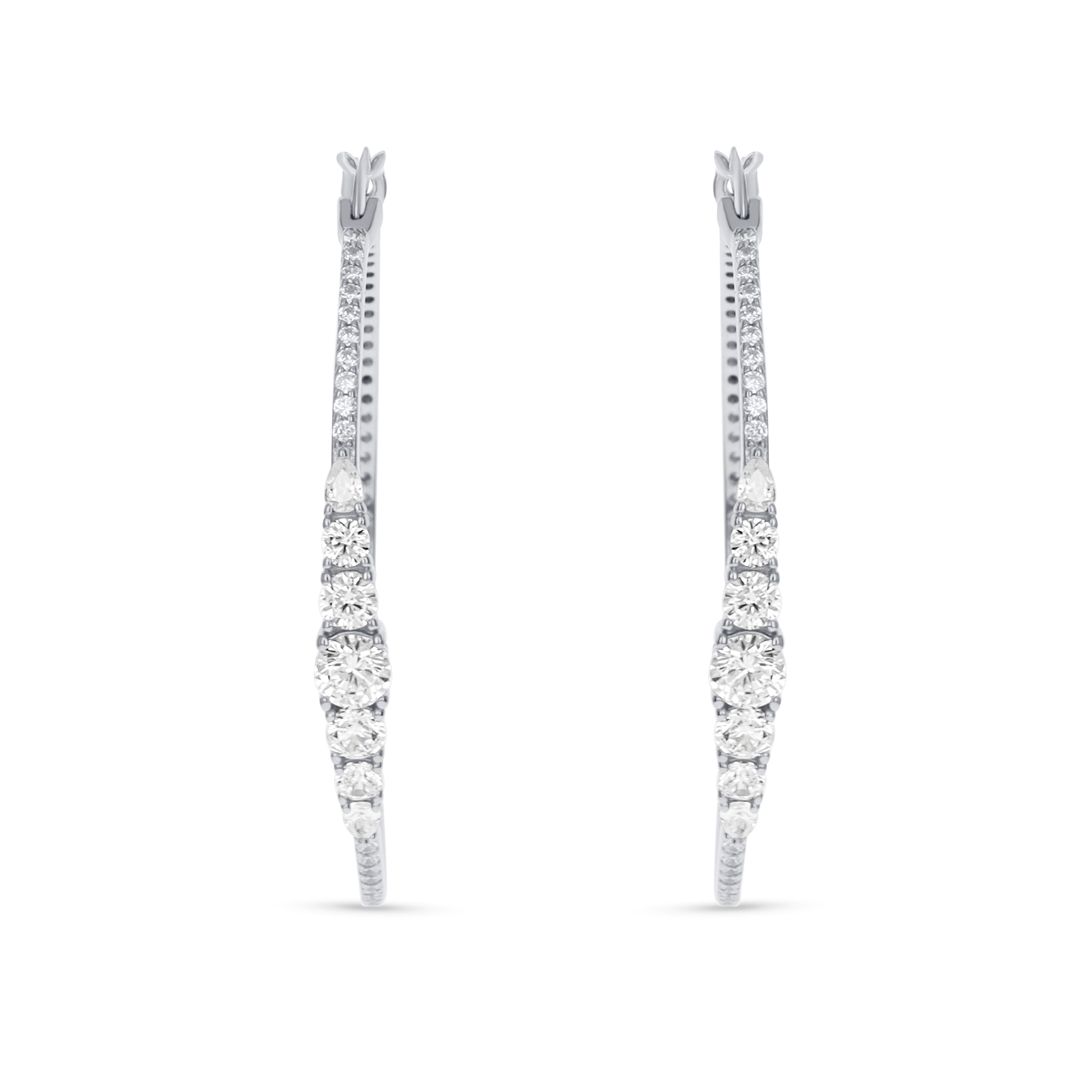 Silver Graduated Hoop Earrings from Alexandra Marks Jewelry. 