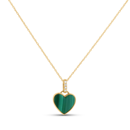 Gold necklace with a green heart-shaped pendant in yellow gold. 
