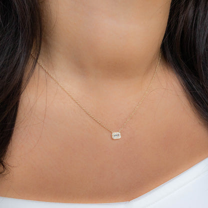 Classic Halo Set Diamond Necklace in Yellow Gold. 