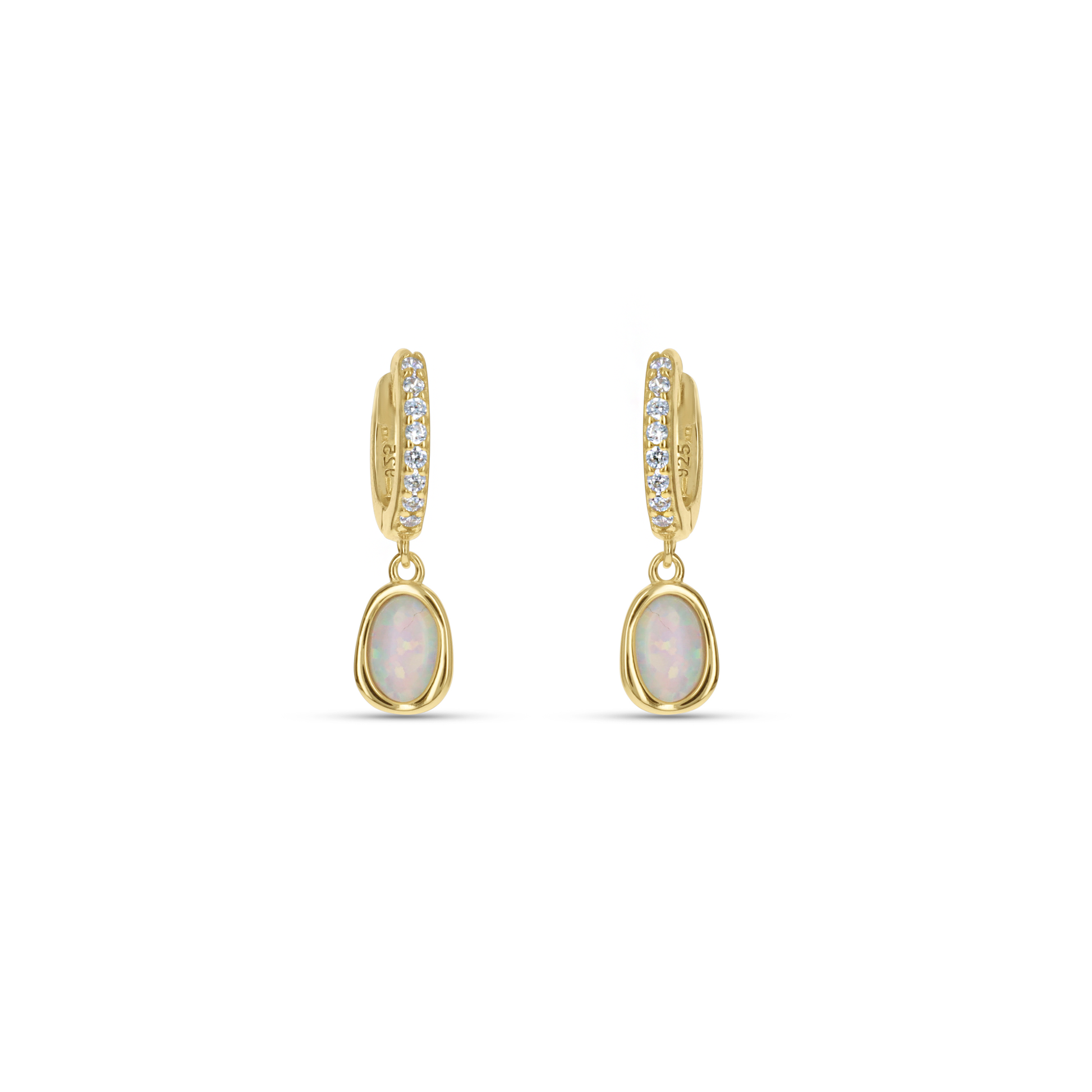 Dainty White Opal Gold Huggie Hoop Earrings from Alexandra Marks Jewelry. 