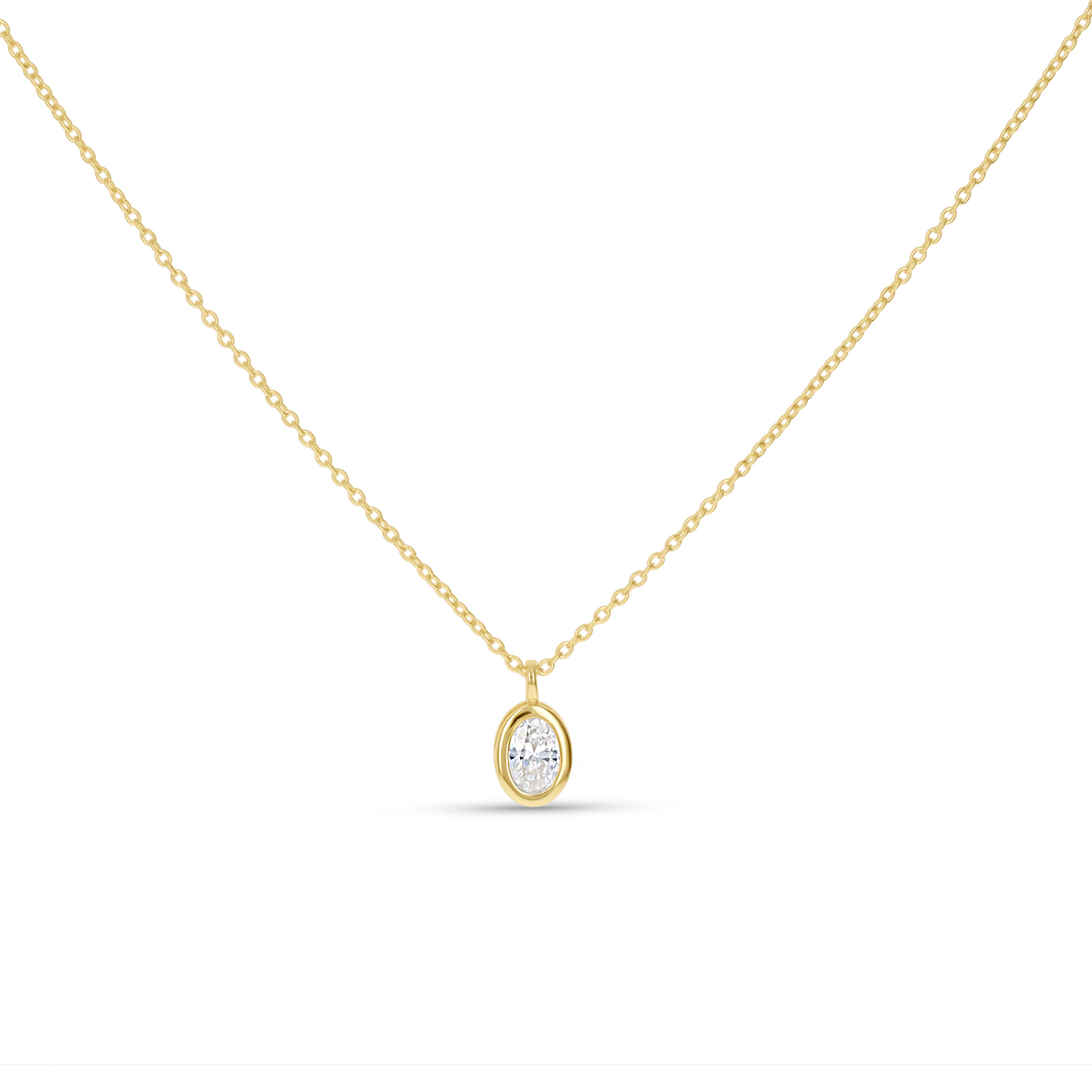 Simple Oval Cubic Zirconia diamond like pendant necklace in gold from Alexandra Marks Jewelry. 