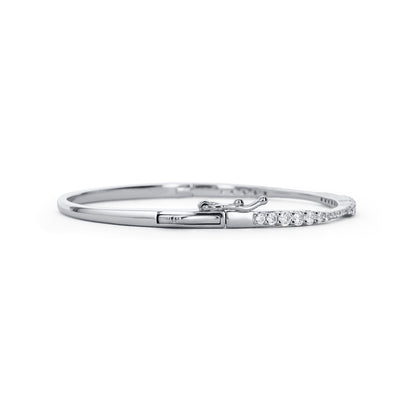 Silver push button safety clasp bangle bracelet from Alexandra Marks Jewelry