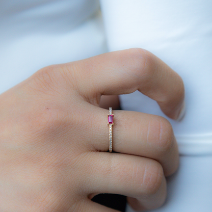 Dainty diamond and ruby stacking ring in gold. 