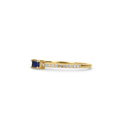 Thin diamond and blue sapphire stacking ring in 14kt yellow gold. 