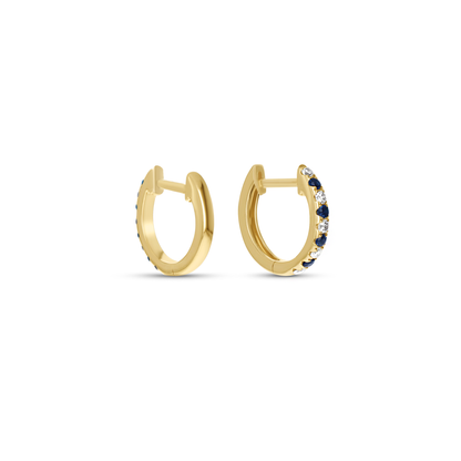 Dainty Diamond and Sapphire Huggie Hoop Earrings in Yellow Gold From Alexandra Marks Jewelry.