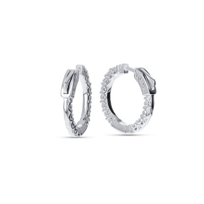Pair of silver hoop earrings on a white background