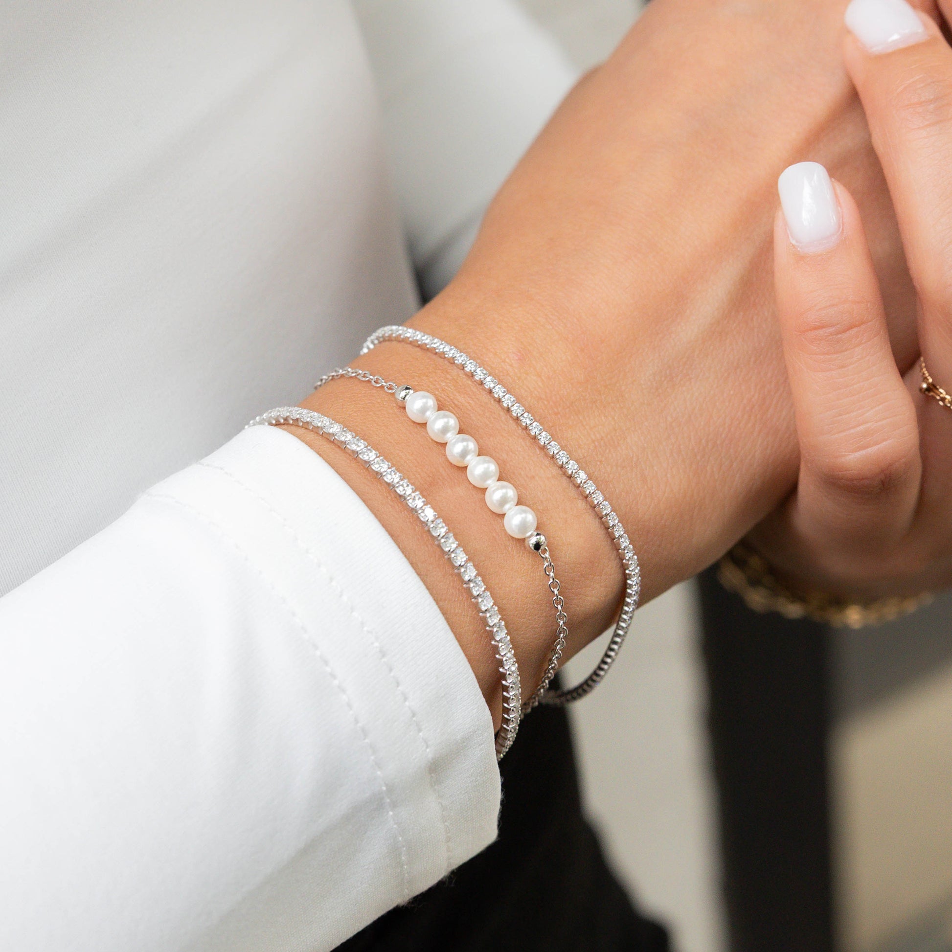 Tennis Bracelets Stacked With A Pearl Bracelet From Alexandra Marks Jewelry