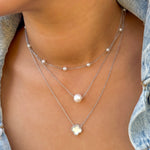 Floating White Pearl Solitaire Necklace in Sterling Silver from Alexandra Marks Jewelry