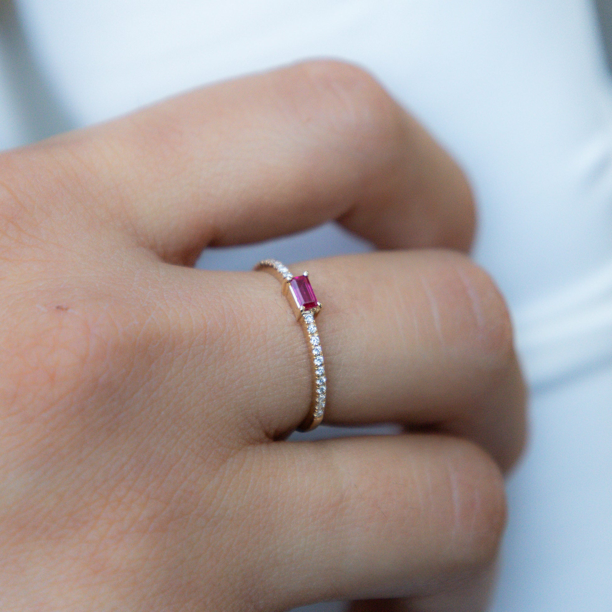 Dainty Ruby birthstone ring in yellow gold. 