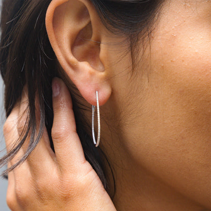 White Gold & Diamond Oval Hoop Earrings from Alexandra Marks Jewelry