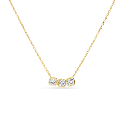 Delicate gold necklace with three bezel set cz stones from Alexandra Marks Jewelry.