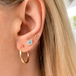 Small Blue Evil Eye Stud Earrings in Gold
