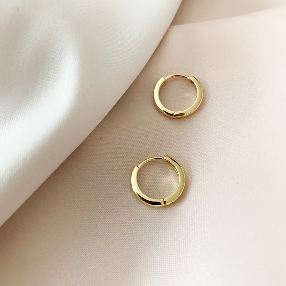 Small high polished gold huggie hoop earrings - Alexandra marks 