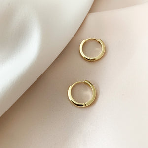 Small high polished gold huggie hoop earrings - Alexandra marks 