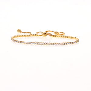 
            
                Load image into Gallery viewer, Adjustable Pull String Gold Plated Sterling Silver CZ Tennis Bracelet - Alexandra Marks Jewelry
            
        