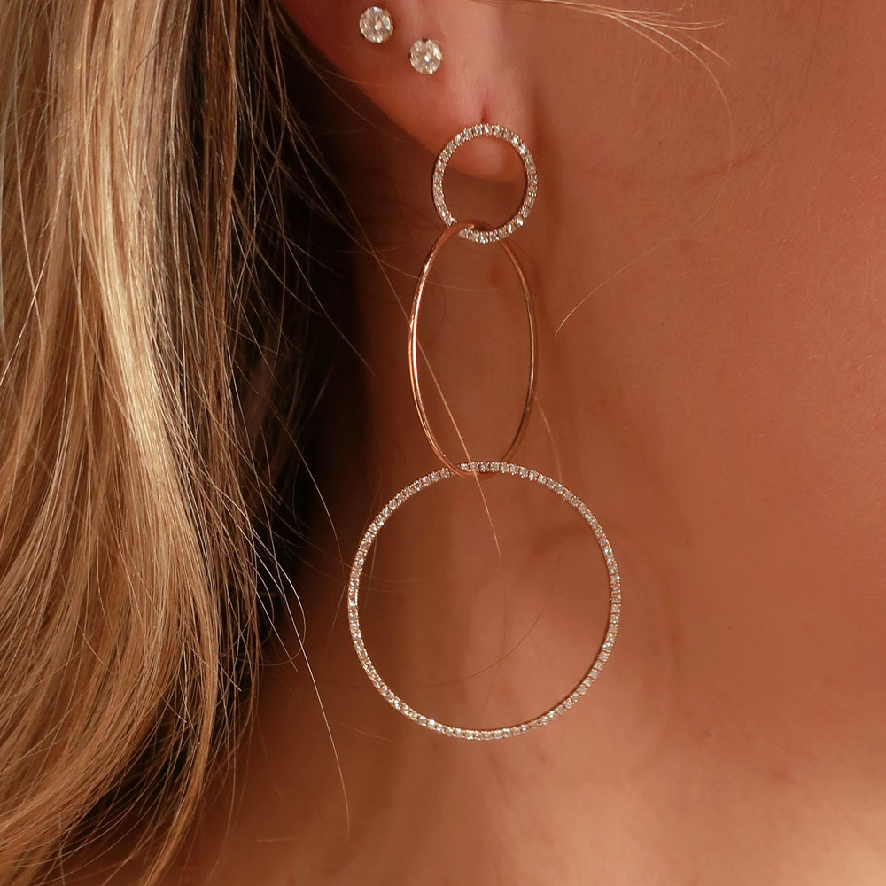 Wearing Alexandra Marks - 14k rose gold triple circle diamond drop earrings 