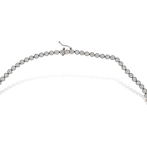 This 4mm tennis necklace from Alexandra Marks Jewelry features round brilliant cz stones that go all the way around
