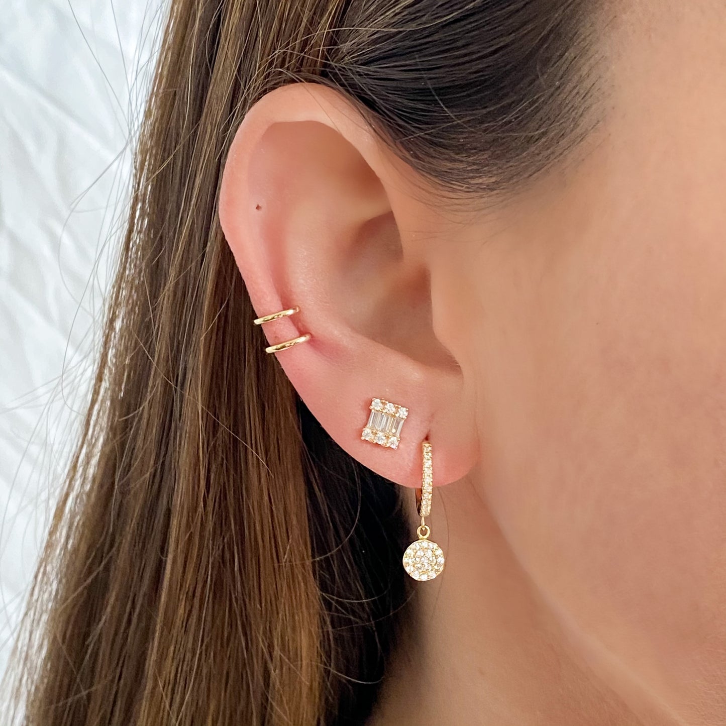 Wearing the gold baguette CZ Stud Earrings from Alexandra Marks Jewelry