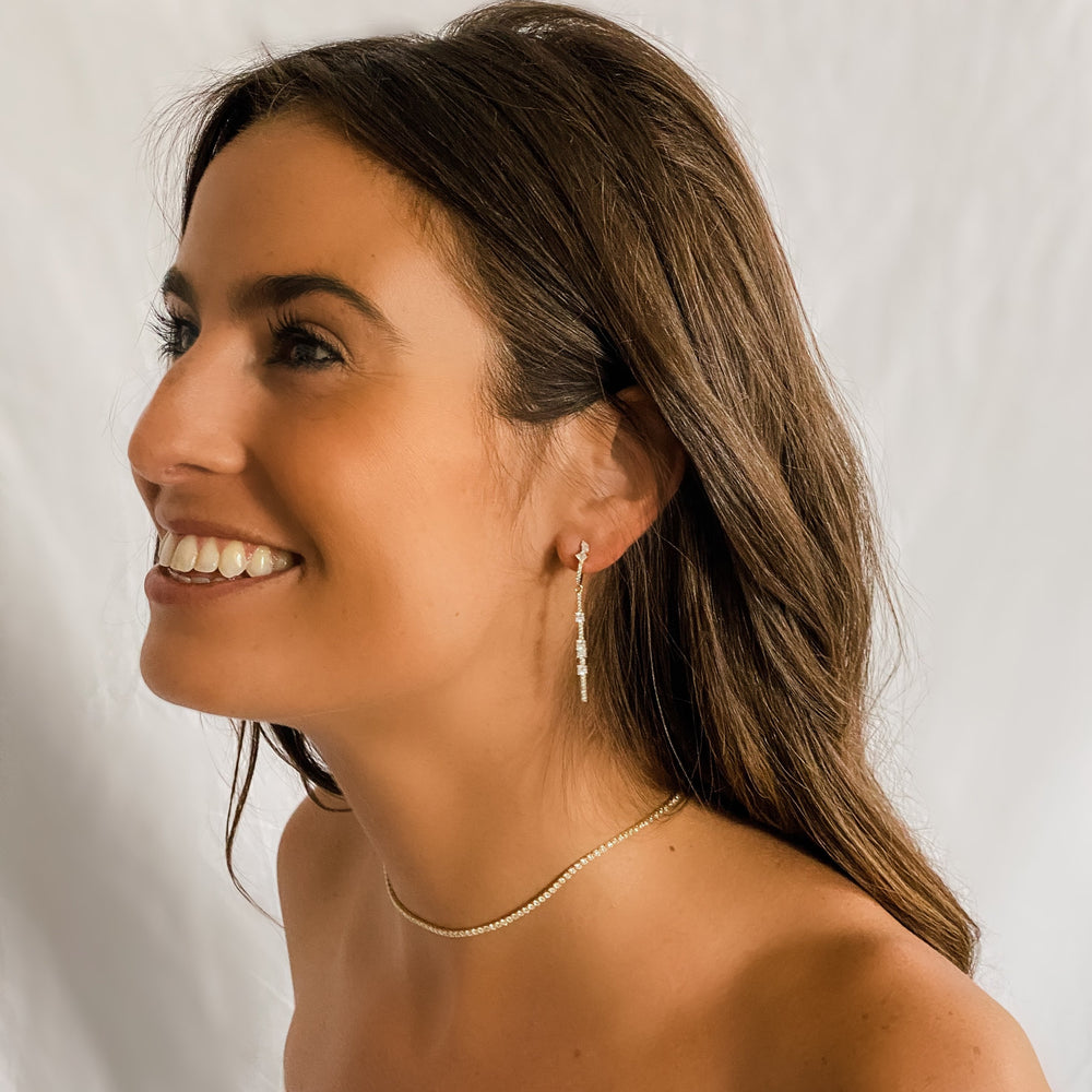 Wearing the mixed cz long bar drop earrings from Alexandra Marks Jewelry