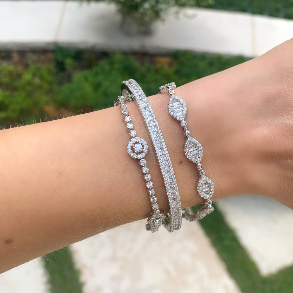 
            
                Load image into Gallery viewer, Stacking Alexandra&amp;#39;s marquise shaped halo CZ tennis bracelet in silver
            
        