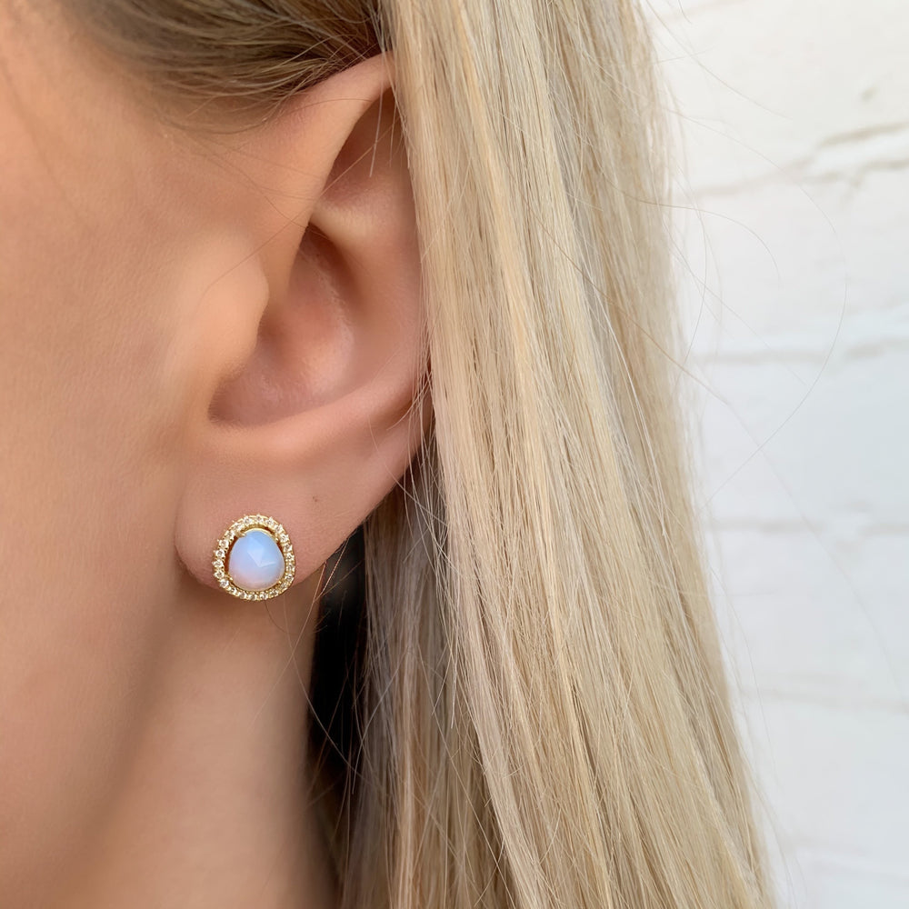 Wearing the gold opal free-form earrings from Alexandra Marks Jewelry