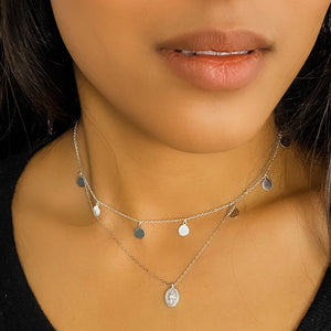 
            
                Load image into Gallery viewer, Wearing the silver compass charm necklace from Alexandra Marks Jewelry
            
        