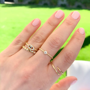 Stacking the gold circle ring from Alexandra Marks Jewelry