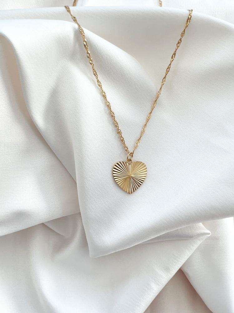 
            
                Load image into Gallery viewer, Starburst Heart Necklace
            
        