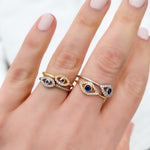 Wearing the gold & silver curved evil eye rings
