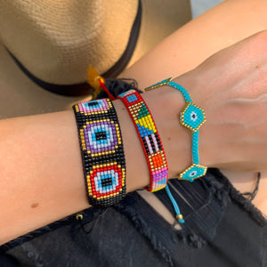 Stacking the turquoise evil eye beaded bracelets from alexandra marks jewelry